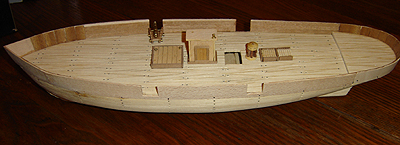 John O'Keefe's partial wooden model of a sail powered ship (view 2), started when he was eleven years old